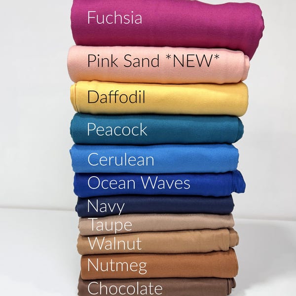 Tejido de poliéster doblemente cepillado: 69 colores, variedad de colores lisos, poliéster y elastano, 170 g/m².
