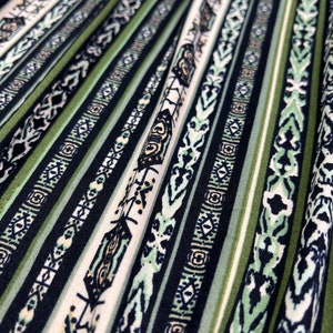 Double Brushed Poly, Green/Cream/Black Vertical Tribal Stripes,