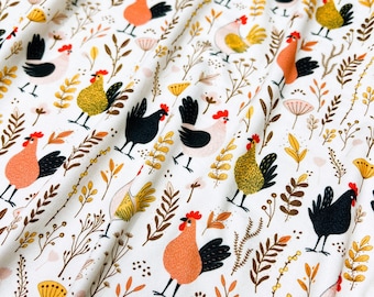May include: White fabric with a repeating pattern of colorful roosters and stylized floral designs. The roosters are in various colors, including red, yellow, and black.