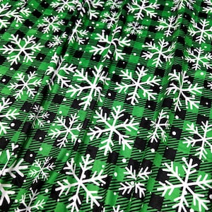 Dubbelborstad polytyg: Grön och svart ginghampläd och snöflingor, 180 GSM