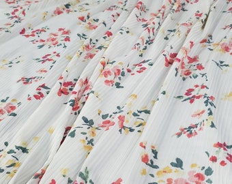 Ribgebreide stof: roze/gele bloemenprint op ivoorkleurige ondergrond, 4x2 ribbels, 180 g/m²