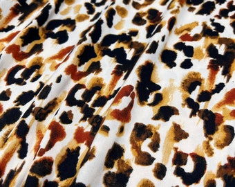 Double Brushed Poly, DBP Fabric, Caramel/Brown Leopard Print w/ Tan Base,