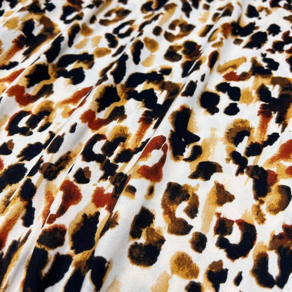 Double Brushed Poly, DBP Fabric, Caramel/Brown Leopard Print w/ Tan Base, Fabric by the 1/2 Yard, Yard, or Sample, 4 Way Stretch