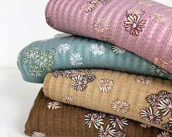 Pointelle Knit Fabric, Ribbed Knit, Scattered Daisies on Purple/Blue/Tan/Brown Base, 100% Poly, 2 Way Stretch