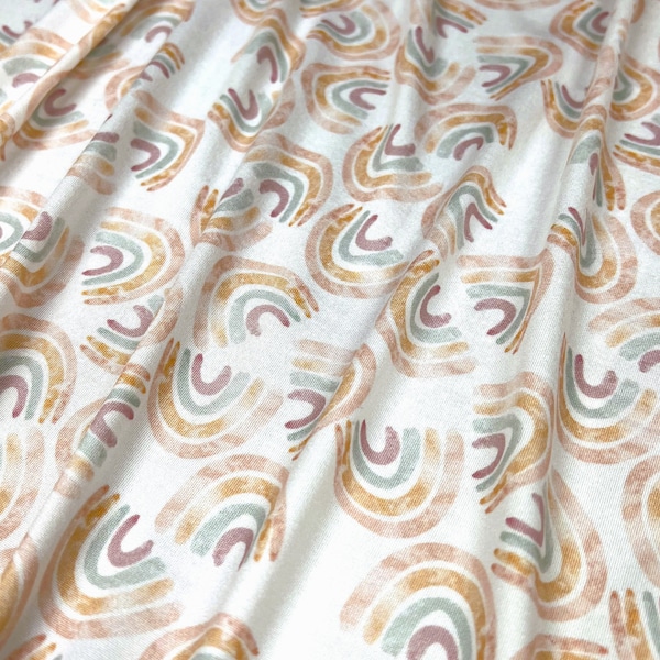 Double Brushed Poly, DBP, Boho Pastel Rainbows Scattered on Ivory Base, Poly Blend, Fabric by the 1/2 Yard, Yard, or Sample, 4 Way Stretch