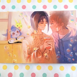 May include: Two people, one with brown hair and the other with blonde hair, are looking at each other. They are holding a cup of orange juice. The background is a light yellow with bubbles.