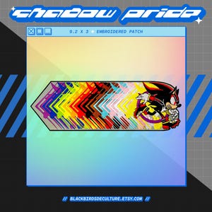 May include: Embroidered patch featuring a colorful geometric design and a character illustration. The patch measures 9.2 x 3 inches. The text "SHADOW PRIDE" is displayed at the top, and the Etsy shop URL is at the bottom.