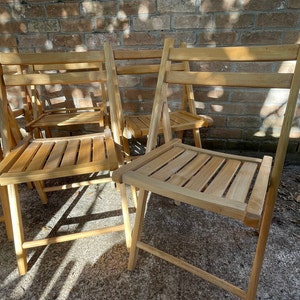 Fold Chairs in a Light Wood Finish