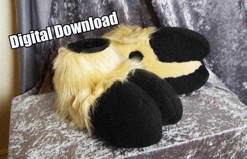 May include: A pair of furry, beige and black paw-shaped hand puppets. The puppets have black claws and a beige fur cuff. The text "Digital Download" is visible in the top left corner of the image.