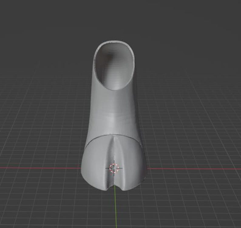 May include: A 3D-rendered, light gray object resembling a high-heeled shoe. The shoe has a rounded toe and a cylindrical heel. The background is a dark gray grid.