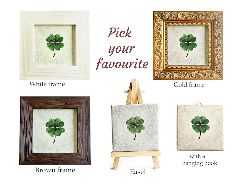 May include: An assortment of framed art pieces featuring a green four-leaf clover. The frames are in white, gold, and brown. One piece is on a small wooden easel, and another has a hanging hook. Text reads "Pick your favourite."
