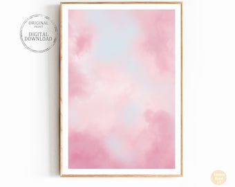 Puede incluir: Una descarga digital de un cielo acuarela rosa y azul con nubes. La imagen está enmarcada en un marco de madera claro.