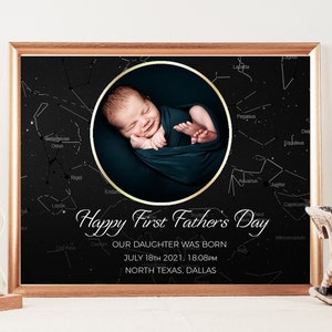 May include: A black and white star chart with a gold circle containing a photo of a baby. The text "Happy First Father's Day" is written below the photo. The text "Our daughter was born July 18th 2021, 18:08pm North Texas, Dallas" is written below the text.