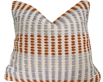 gray and rust pillows