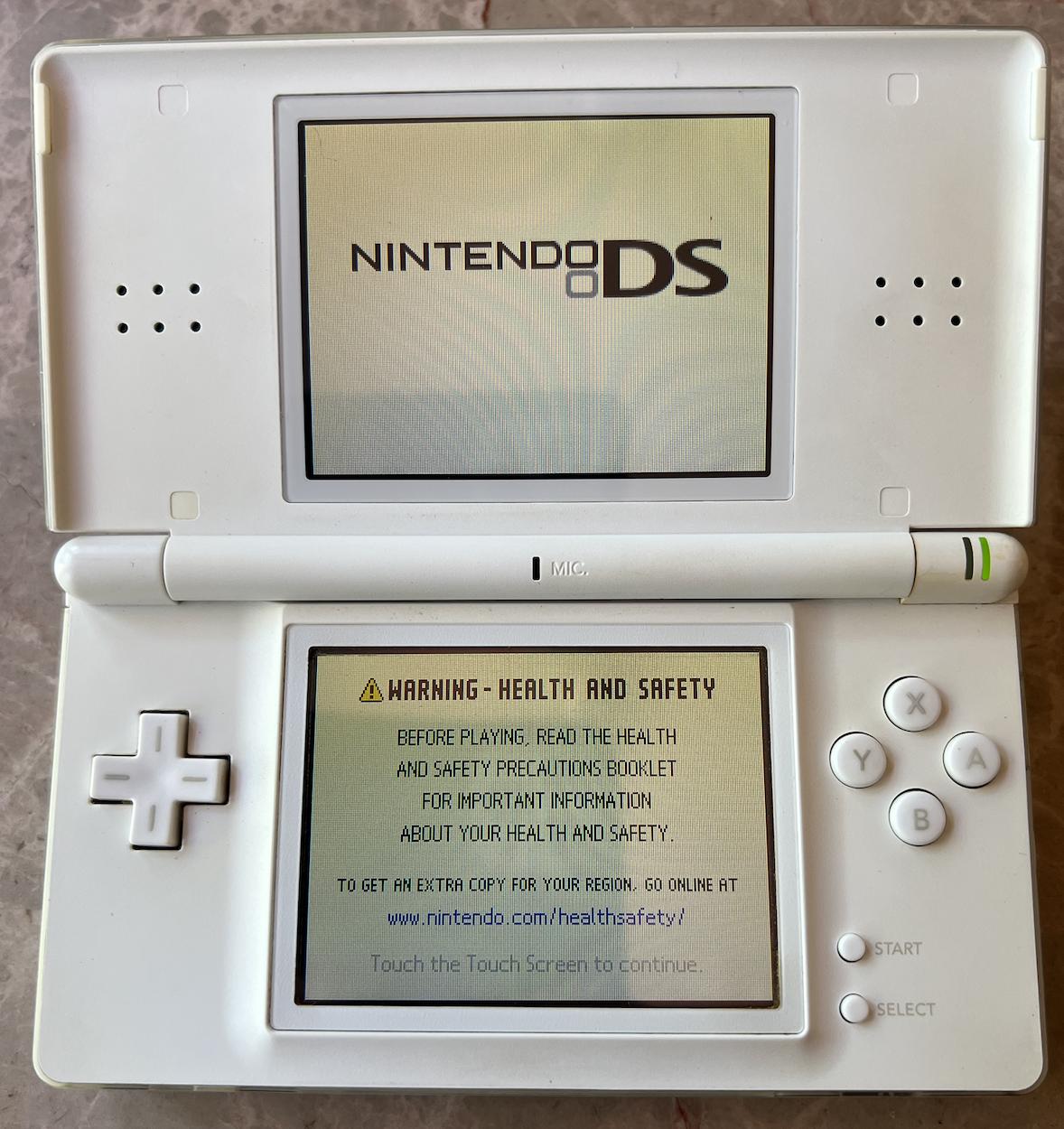 Authentieke originele Nintendo DS Lite met oplader. Getest op werking