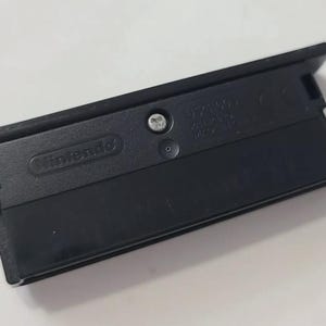 Osłona przeciwpyłowa gniazda 2 do Nintendo DS Lite GBA Oryginalna OEM