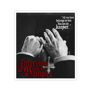 May include: A sticker featuring a black and white image of hands with a ring, and the text "All my love belongs to you. You are its keeper." The words "Interview with the Vampire" are in red.