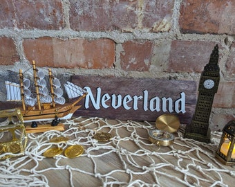 Peter Pan Centrepiece Set Neverland Sign, Pirate Ship, Chest, Coins, Big Ben, Compass, Treasure Necklace, Fairy Lantern, Fishing Net Party