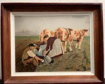 In the field of cows men and a woman signed Rep. E. Fluhmann 1941 painting