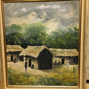 Beautiful oil on board painting of African village scene signed BADJOKA
