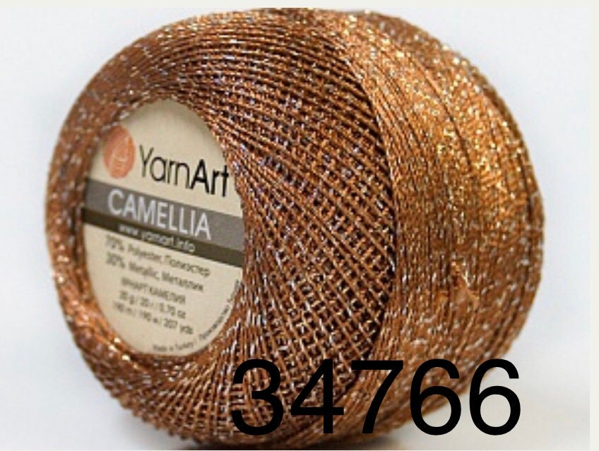 ирис гамма пряжа металлик. пряжа yarnart camellia. нитки золотой шар цвет 3203. пряжа голд 9051. золотистая пряжа.