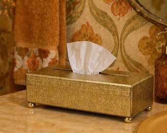 Caja de pañuelos vintage de los años 70 de Crossman Los Ángeles con acabado dorado brillante.