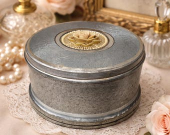 Caja de música/polvorín vintage de los años 60 con tapa floral y caja de música, de metal, estilo MCM.