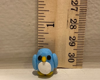 Cute miniature clay penguin
