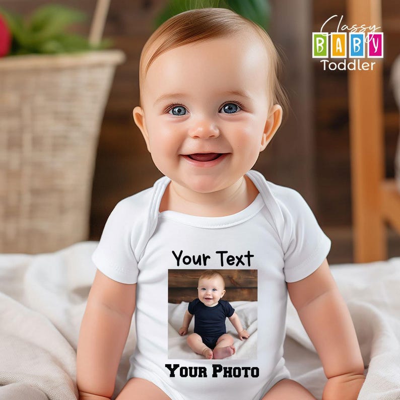 a baby sitting on a bed wearing a white bodysuit