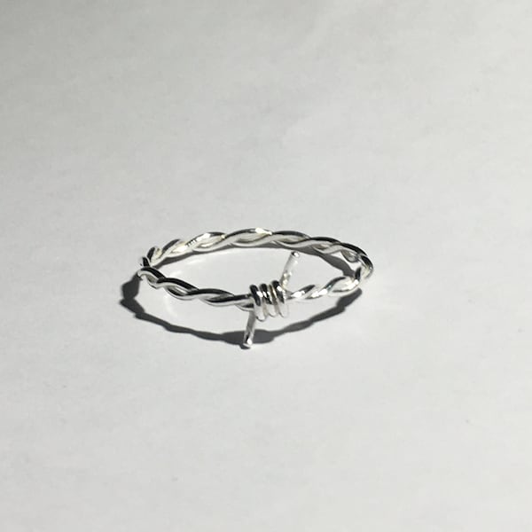 Sterling silver Dainty Barbed wire ring, single barb.