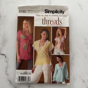 May include: A set of three ceramic mugs with a speckled, matte finish. The mugs are in shades of cream, light gray, and dark gray. Each mug has a simple, minimalist design, perfect for coffee or tea.