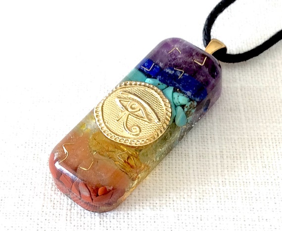 Orgone Energy stick pendant necklace with golden Eye of Horus and Seven Chakra healing Crystals. Made in USA