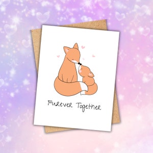 May include: A card with a cute illustration of two foxes, one larger than the other, with the text "Furrever Together".