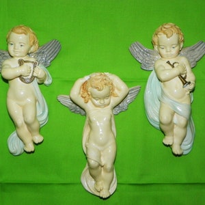 Trio of Resin Cherub Angels Wall Hanging Plaques