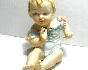 Vintage Bisque Piano Baby Figurine | Blue Romper with Pink Bows | Numbered Bisque Baby Collectible | Nursery Décor