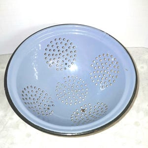 May include: A rustic wooden sign with the text "Welcome to our home" in white lettering. The sign features a distressed finish and a simple, inviting design, perfect for front door decor.