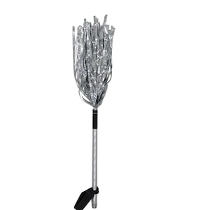 May include: A silver metallic pom-pom on a silver pole with a black handle. The pom-pom is made of long, thin strips of shiny material. The pole has a black strap near the bottom.
