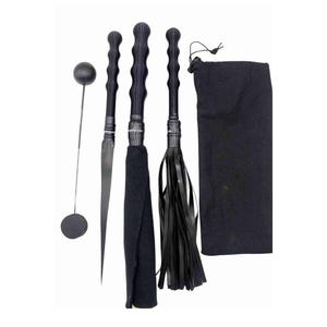 May include: A black BDSM kit featuring a ball gag, a slender blade, two floggers, and a drawstring bag. The handles are dark wood, and the floggers have black leather strips.