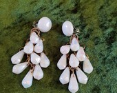 Earings, chandelier style clip on. 1960 39 s, goldtone rings with white faceted beads, with mother of pearl effect.