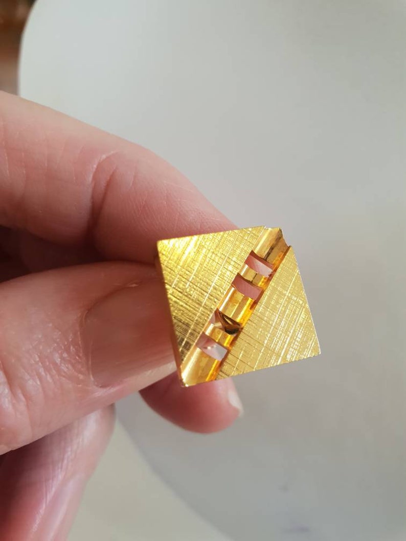 Cufflinks textured goldtone in an abstract design. 1970/'s