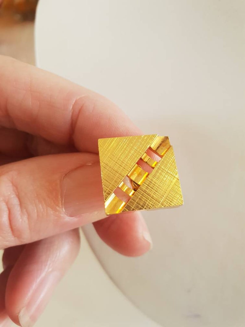 Cufflinks textured goldtone in an abstract design. 1970/'s
