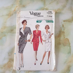 May include: Vogue Patterns sewing pattern number 7720 for sizes 8-10-12. The pattern features three women wearing different variations of a suit with a jacket and skirt. The pattern is labelled "Very Easy" and "Tres Facile".