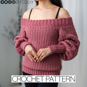 Könnte beinhalten: Ein Häkelmuster für einen rosa Off-Shoulder-Pullover mit Puffärmeln. Das Muster ist zum Kauf erhältlich.