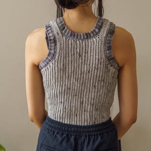 TCDDIY crochet pattern for an Easy Crochet Tank Top featuring a stretchy knit-like design. Crafted using Red Heart Super Saver yarn in Soapstone and Dove, back view.