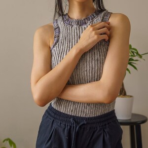 TCDDIY crochet pattern for an Easy Crochet Tank Top featuring all-slip stitches for a stretchy knit-like design. Crafted using Red Heart Super Saver yarn in Soapstone and Dove.