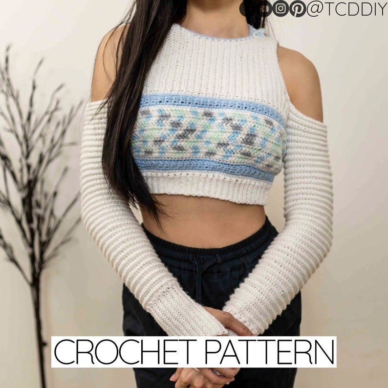 TCDDIY crochet pattern for a cold shoulder cropped hoodie with herringbone hood and thumbholes, crafted using Baby Bernat Sport yarn in White, Cool Blue, and Baby Blue.