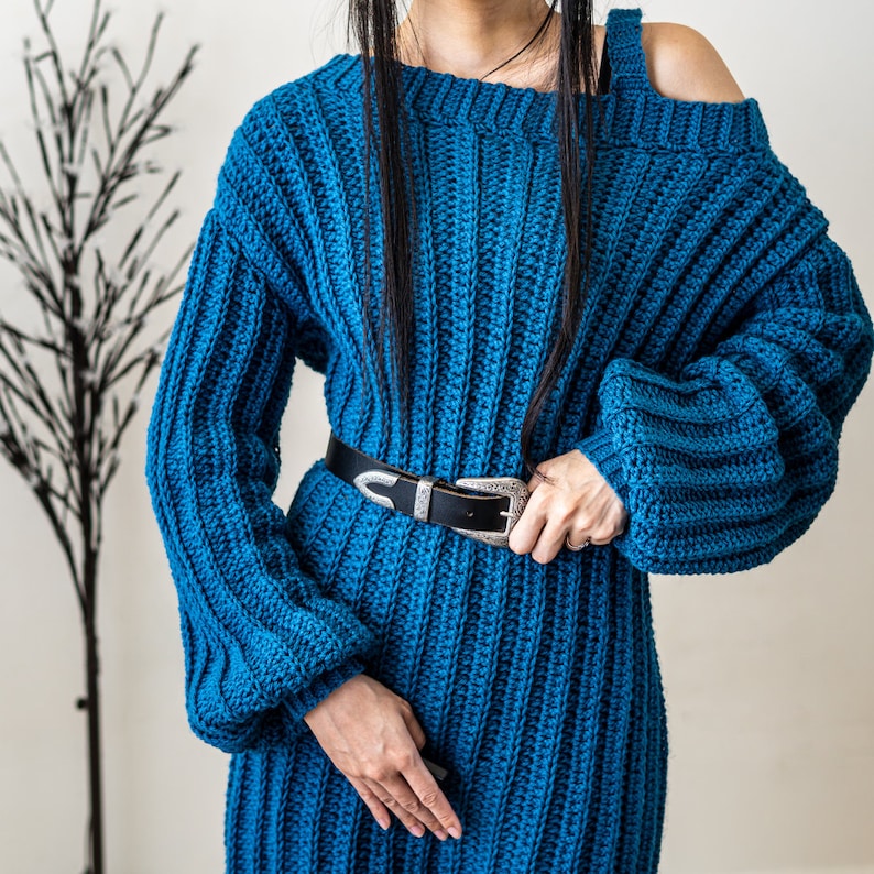 TCDDIY crochet pattern for a single strap sweater dress featuring balloon sleeves and a customizable length, crafted using Caron One Pound yarn in Ocean.