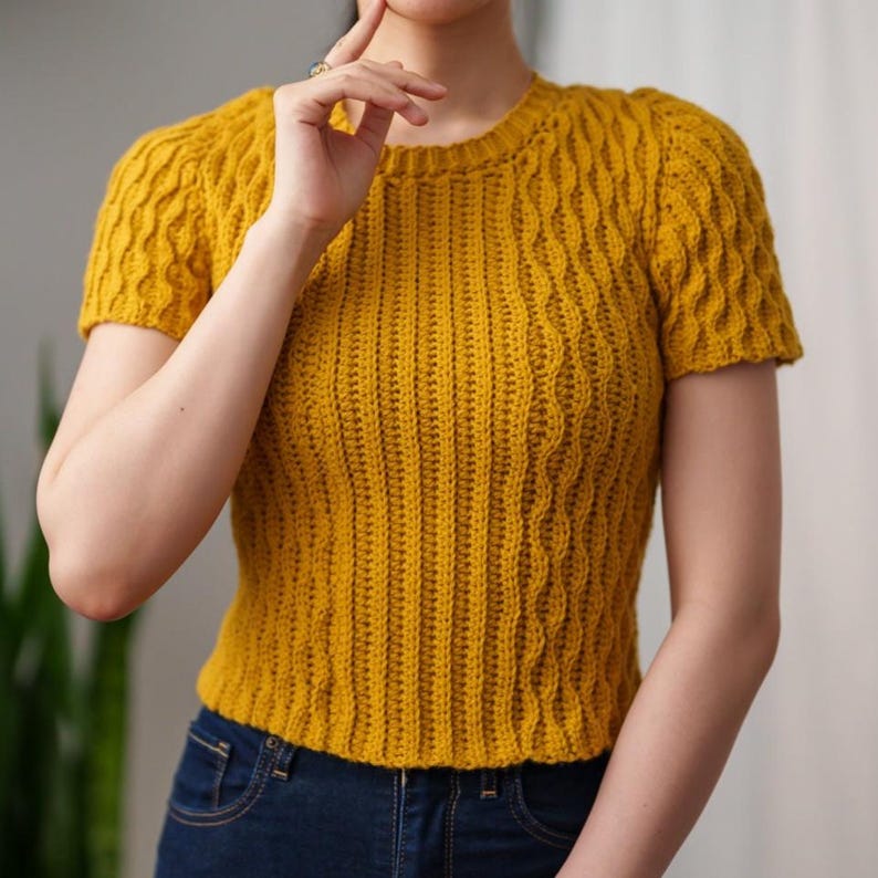 TCDDIY crochet pattern for a modern short sleeve crew neck t-shirt with almond stitch detail, crafted using Lion Brand Pound of Love yarn in Maize.