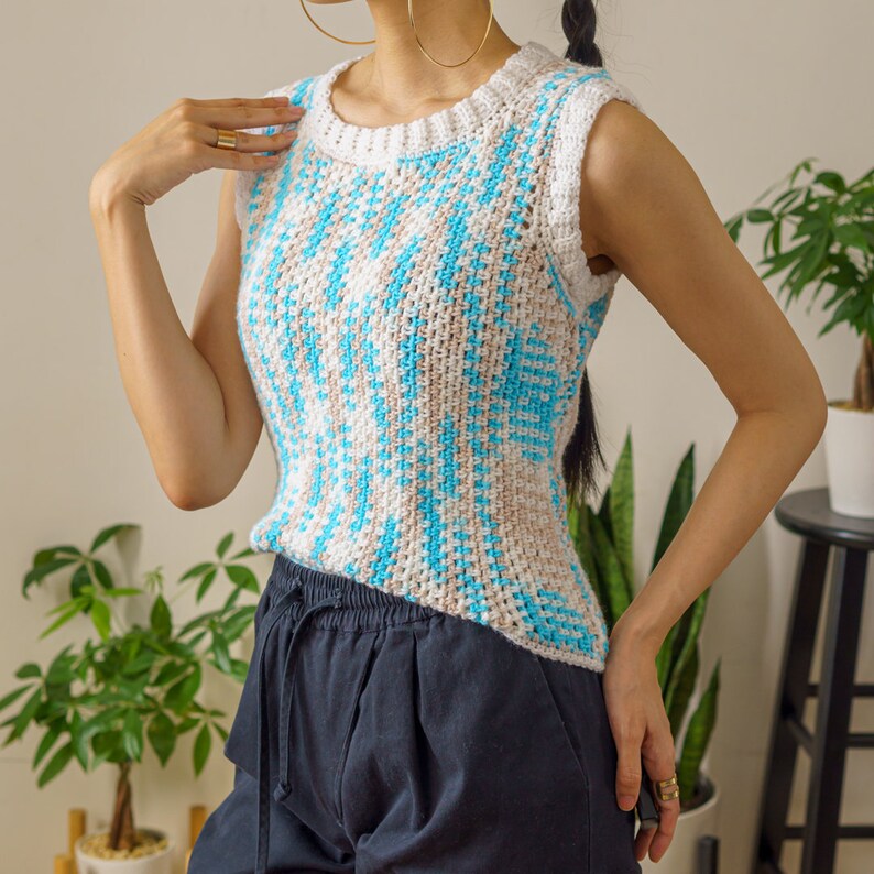 TCDDIY crochet pattern for an easy moss stitch tank top with a slouchy fit, beginner-friendly, crafted using Bernat Baby Sport yarn in Popsicle Blue and White.
