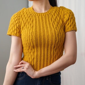 TCDDIY crochet pattern for a modern short sleeve crew neck t-shirt with almond stitch detail, crafted using Lion Brand Pound of Love yarn in Maize.